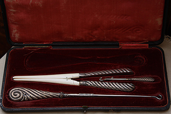 Corset and Boot tools sitting in a carry case that sits in the first guest bedroom in the museum at Government House SK