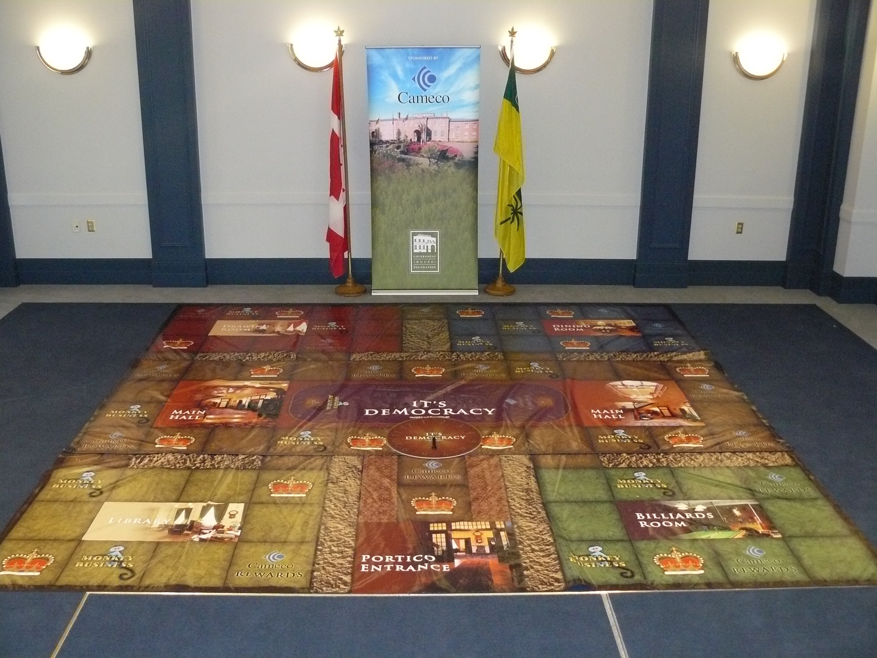 A giant board game on the floor of a room.